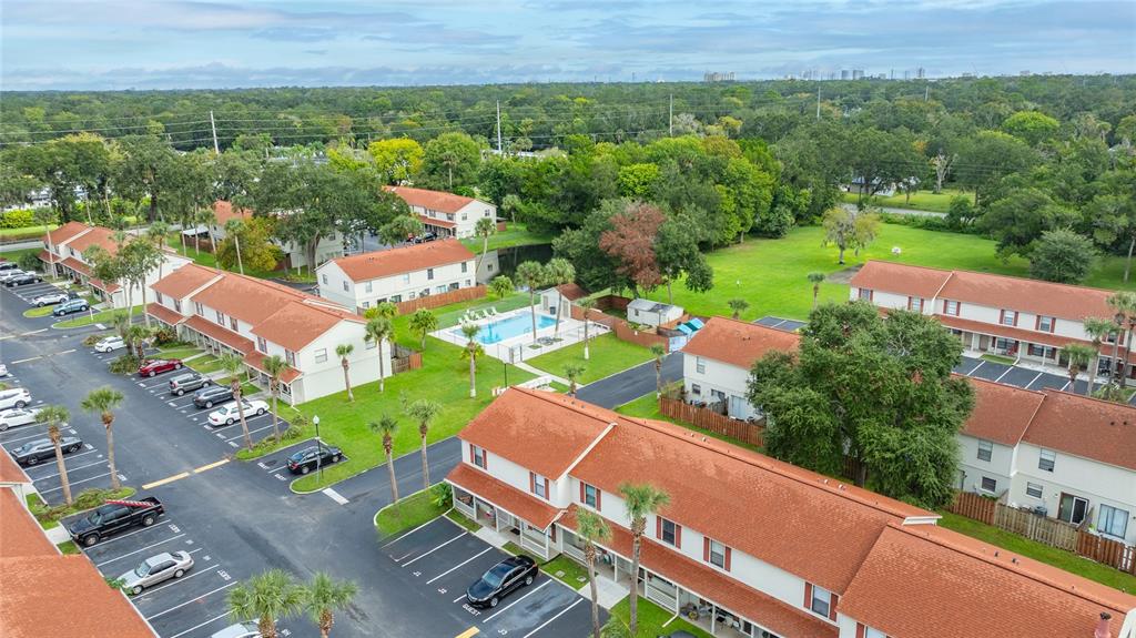 980 Canal View Boulevard, Unit J4 Port Orange, FL 32129 - Photo 23 of 25 an aerial view of a house with a garden
