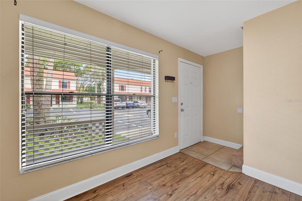 980 Canal View Boulevard, Unit J4 Port Orange, FL 32129 - Photo 3 of 25 a view of a room that has a window in it