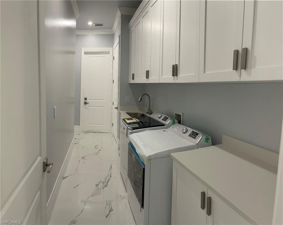 3203 68th Street Southwest Naples, FL 34105 - Photo 30 of 34 a utility room with dryer and washer