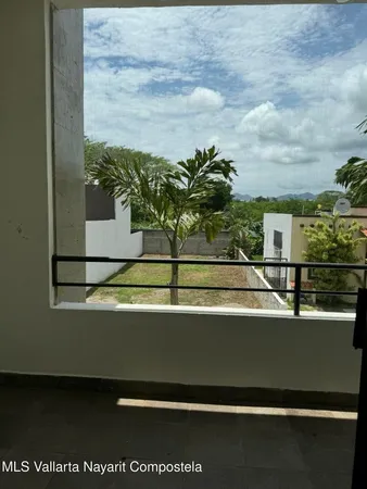 a view of a balcony with an outdoor space