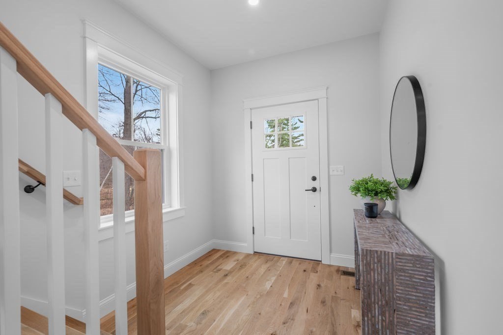 48 Beach Road, Unit C Salisbury, MA 01952 - Photo 3 of 41 a view of an entryway with wooden floor