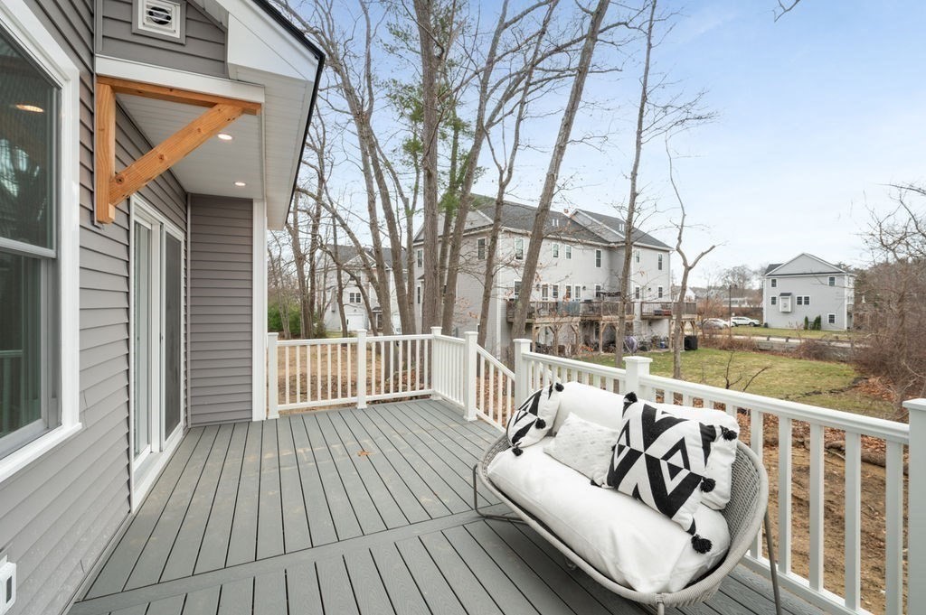 48 Beach Road, Unit C Salisbury, MA 01952 - Photo 38 of 41 a balcony with hardwood