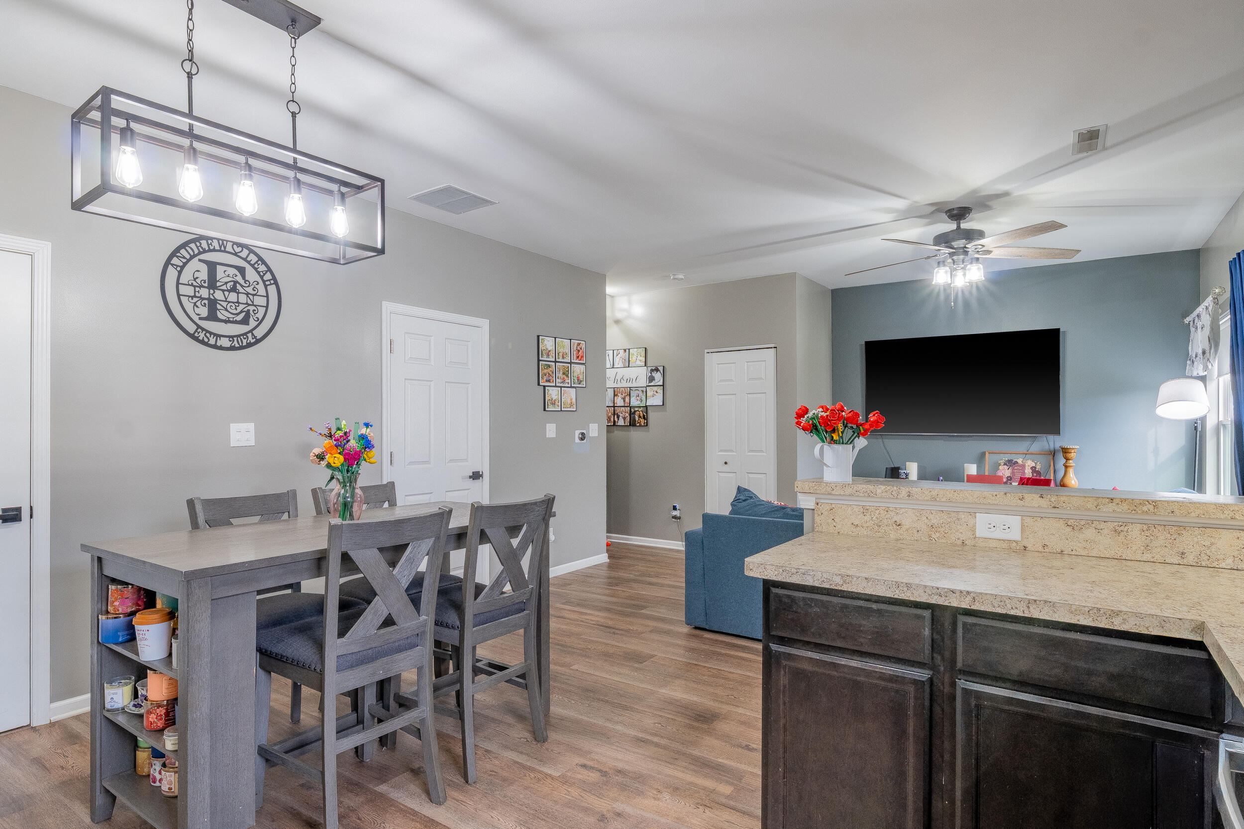 11165 Orange Street Crown Point, IN 46307 - Photo 12 of 33 a view of a dining room with furniture and a chandelier