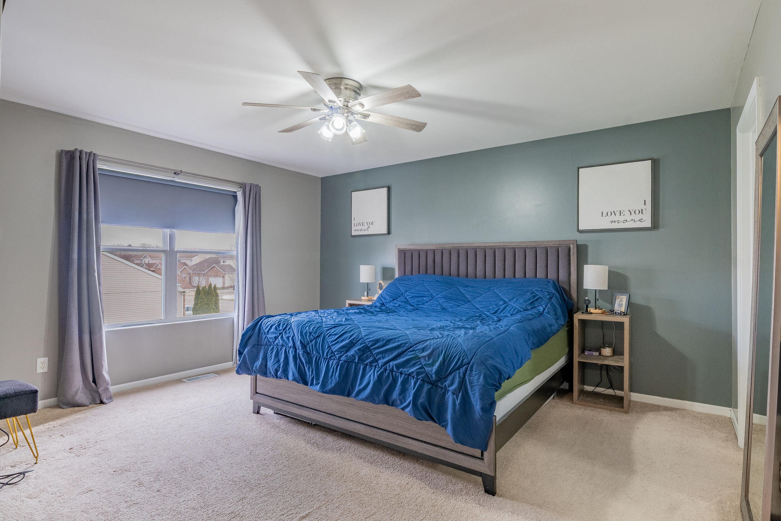11165 Orange Street Crown Point, IN 46307 - Photo 17 of 33 a spacious bedroom with a bed and window