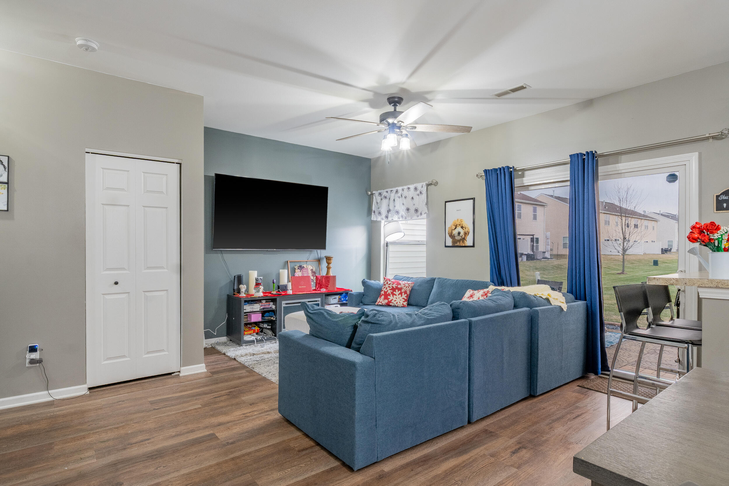 11165 Orange Street Crown Point, IN 46307 - Photo 5 of 33 a living room with furniture and a flat screen tv