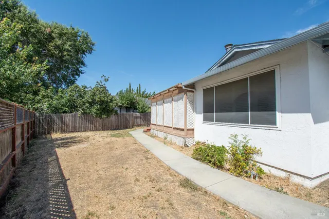 a house with trees in front of it