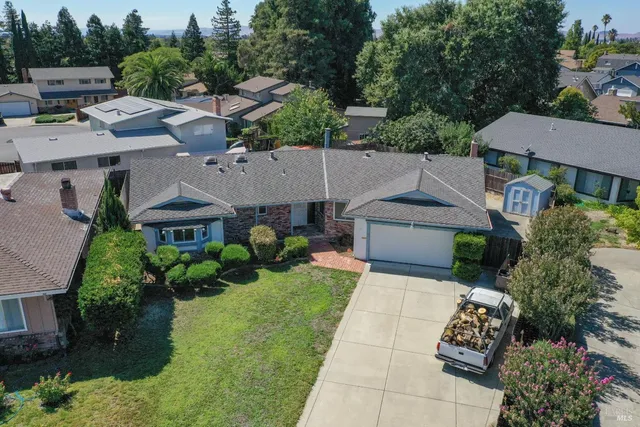 an aerial view of a house with garden