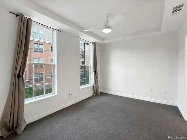 a bathroom with a double vanity sink and mirror