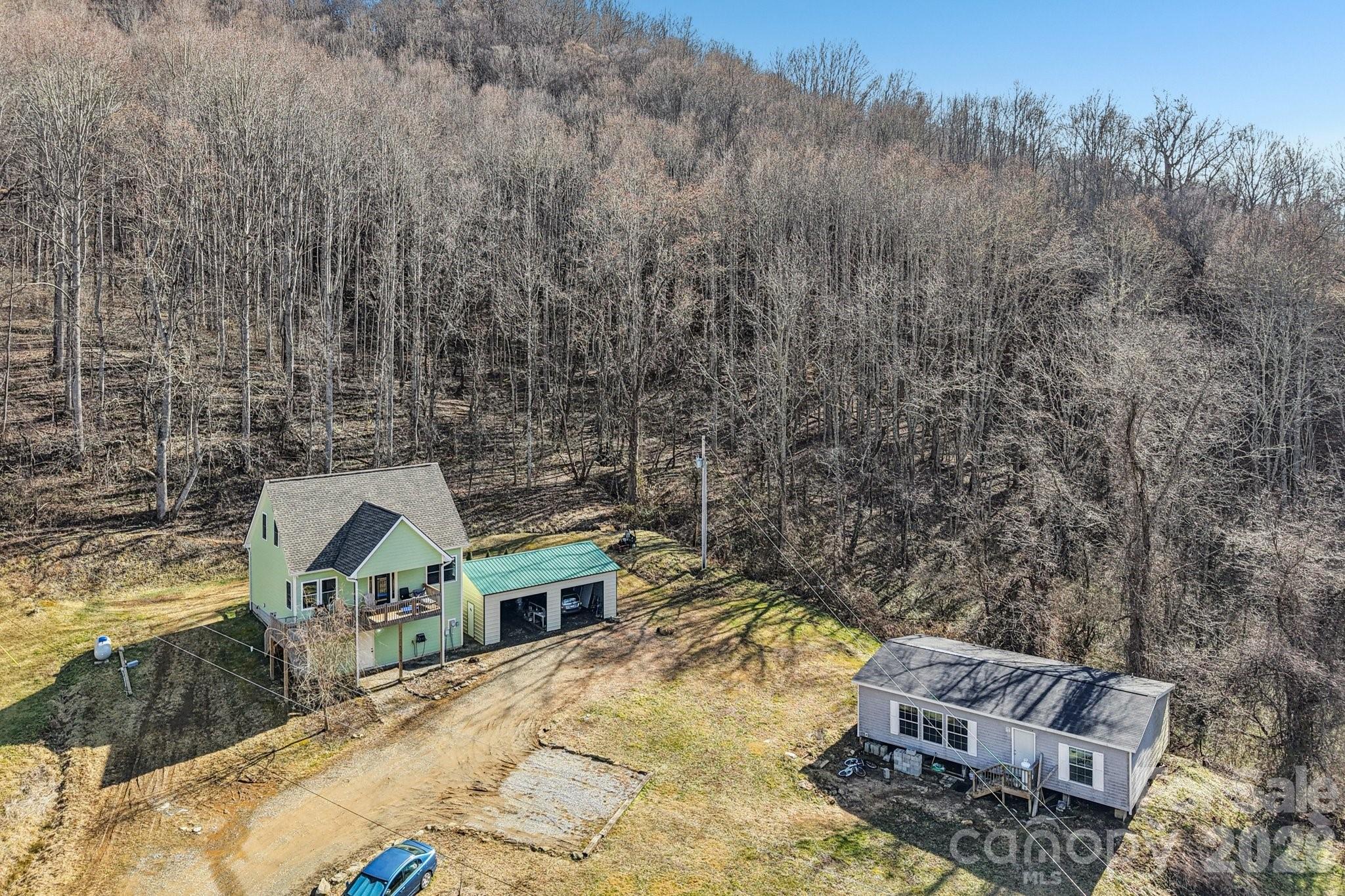 a view of houses with trees