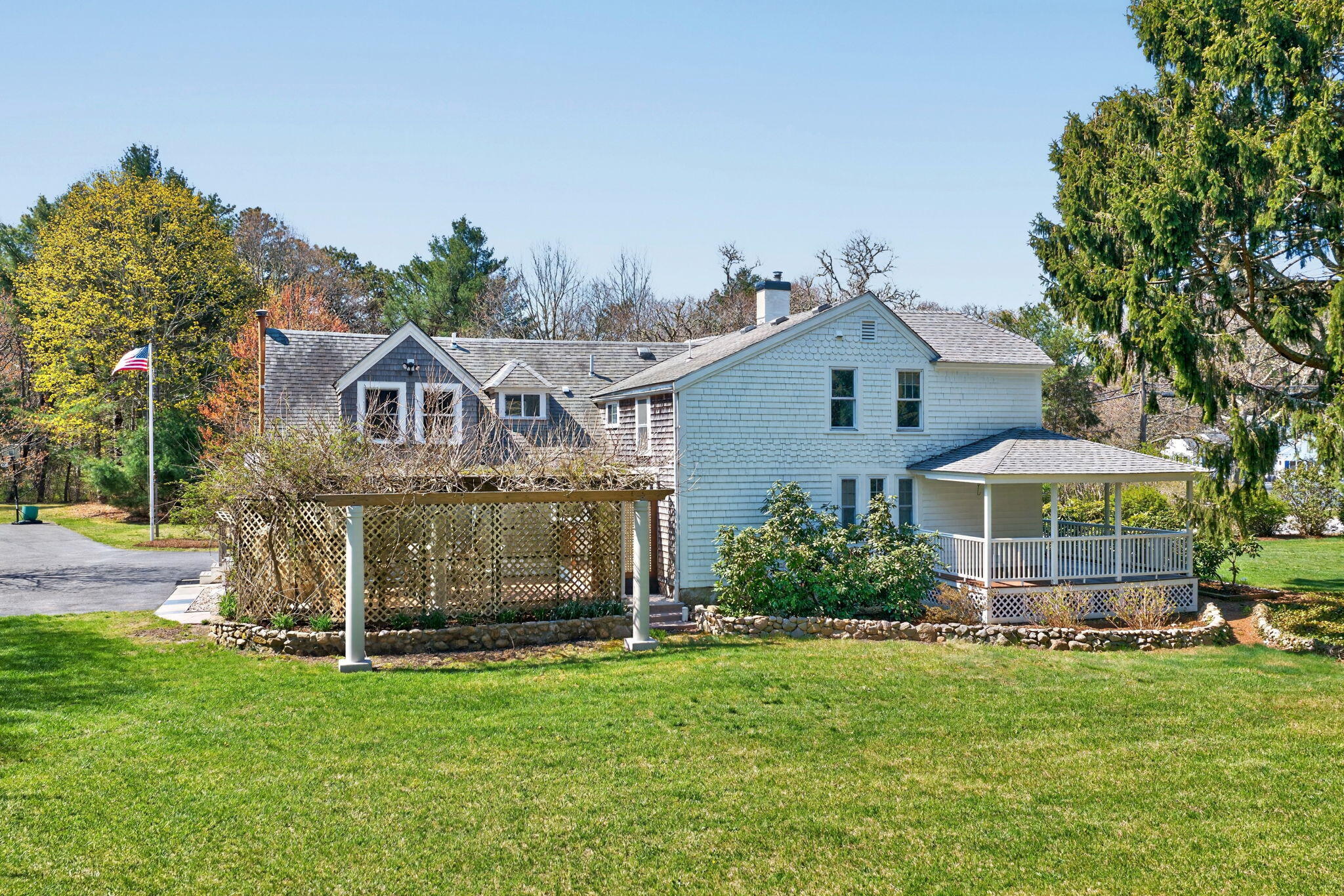69 County Road Bourne, MA 02532 - Photo 53 of 54 a view of a house with a yard