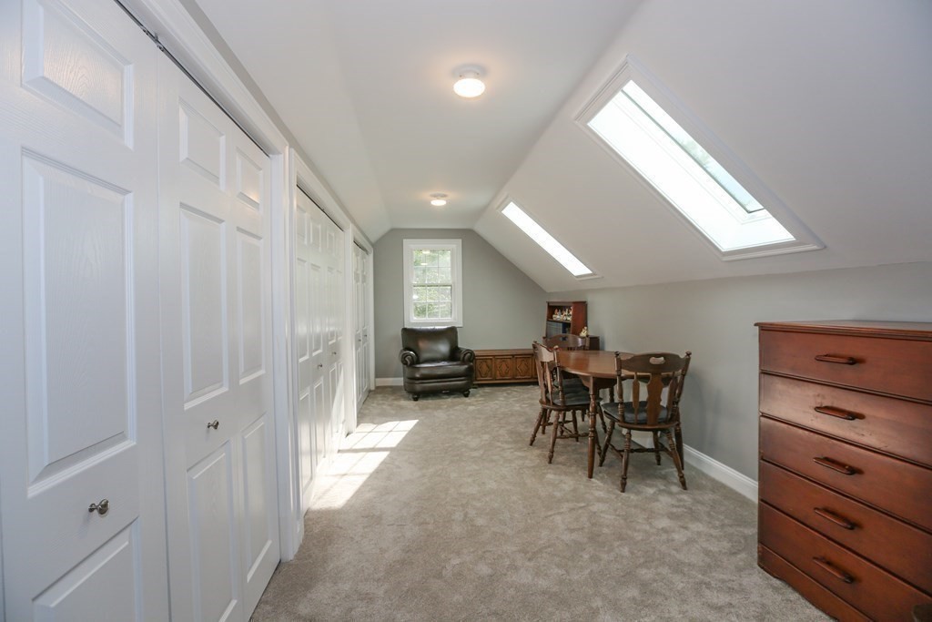 3 Jade Hill Road Auburn, MA 01501 - Photo 19 of 27 a view of a livingroom with furniture and window