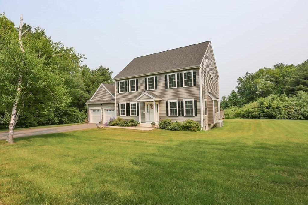 3 Jade Hill Road Auburn, MA 01501 - Photo 2 of 27 a view of a house with a big yard and large trees