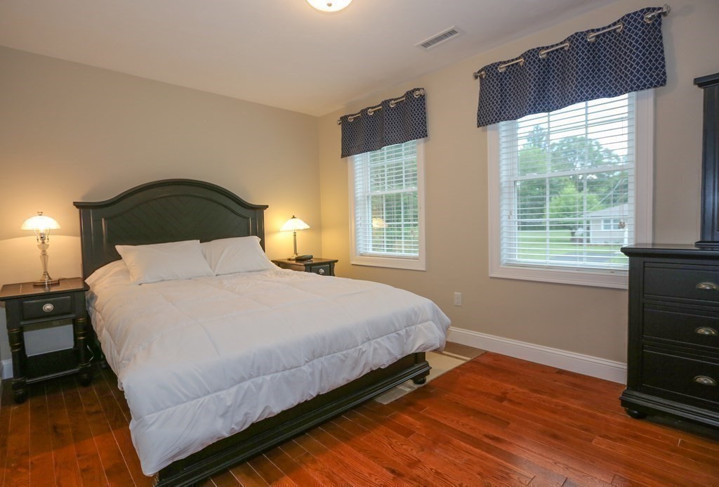 3 Jade Hill Road Auburn, MA 01501 - Photo 22 of 27 a bedroom with a bed and window