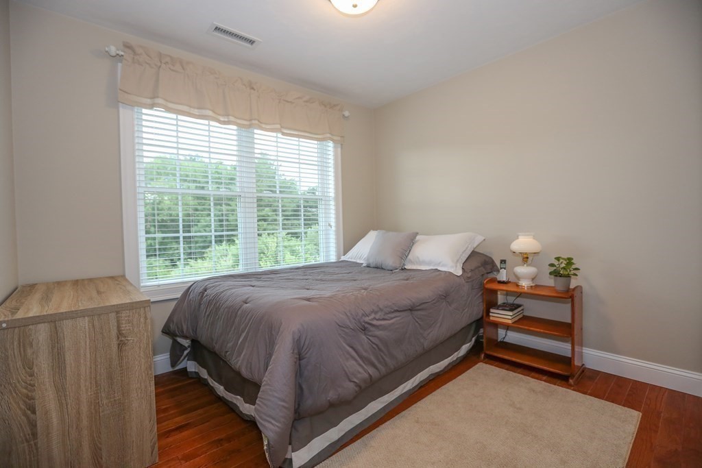3 Jade Hill Road Auburn, MA 01501 - Photo 23 of 27 a bedroom with a bed and window