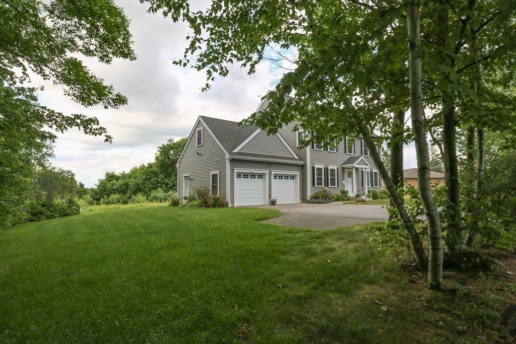 3 Jade Hill Road Auburn, MA 01501 - Photo 26 of 27 a view of house with a big yard plants and large trees