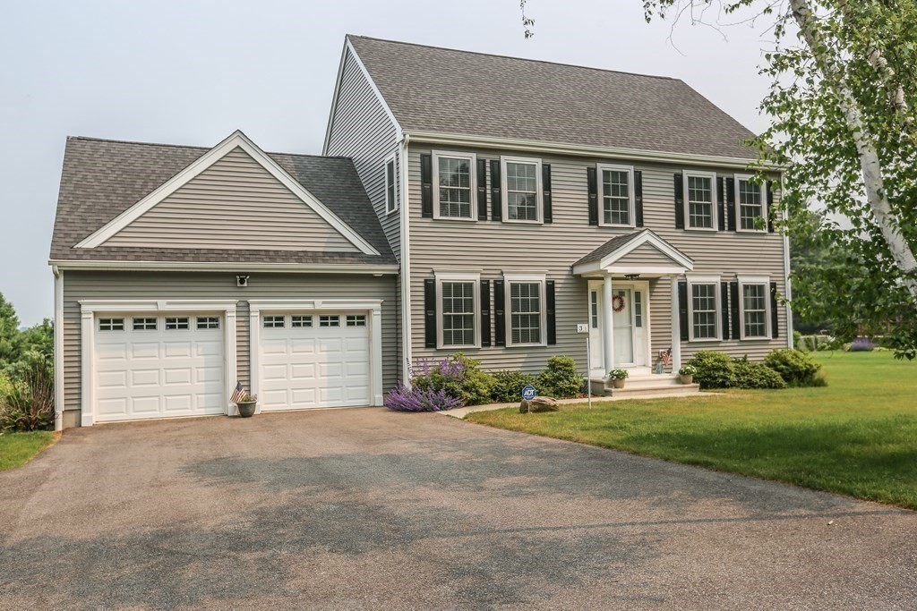 3 Jade Hill Road Auburn, MA 01501 - Photo 3 of 27 a front view of a house with a yard