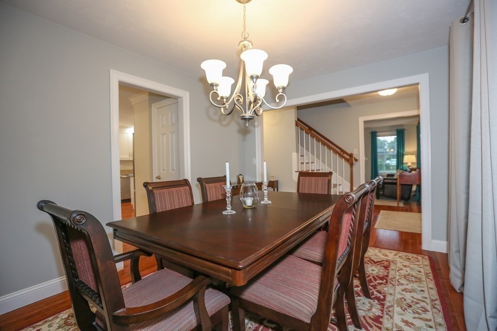 3 Jade Hill Road Auburn, MA 01501 - Photo 5 of 27 a view of a dining room with furniture and wooden floor