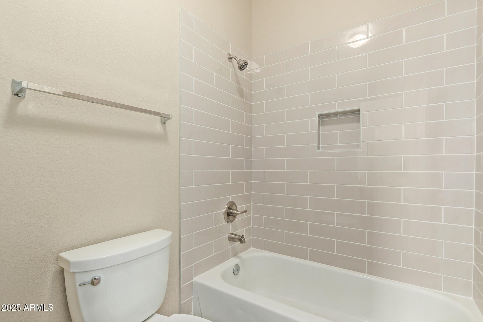 434 East Sheffield Avenue Gilbert, AZ 85296 - Photo 17 of 52 a bathroom with a bathtub and a toilet