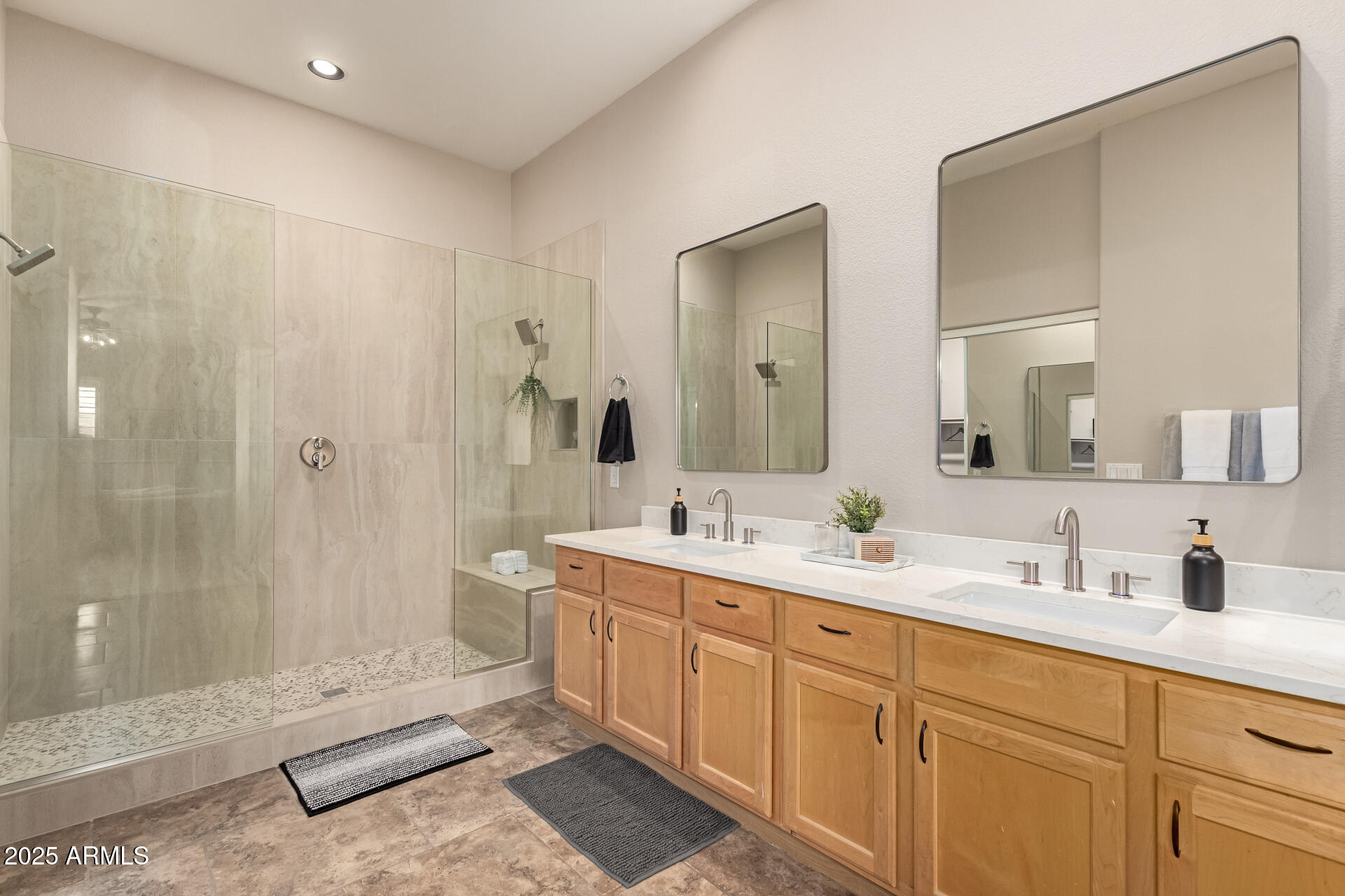 434 East Sheffield Avenue Gilbert, AZ 85296 - Photo 2 of 52 a spacious bathroom with double sink a toilet a mirror and shower