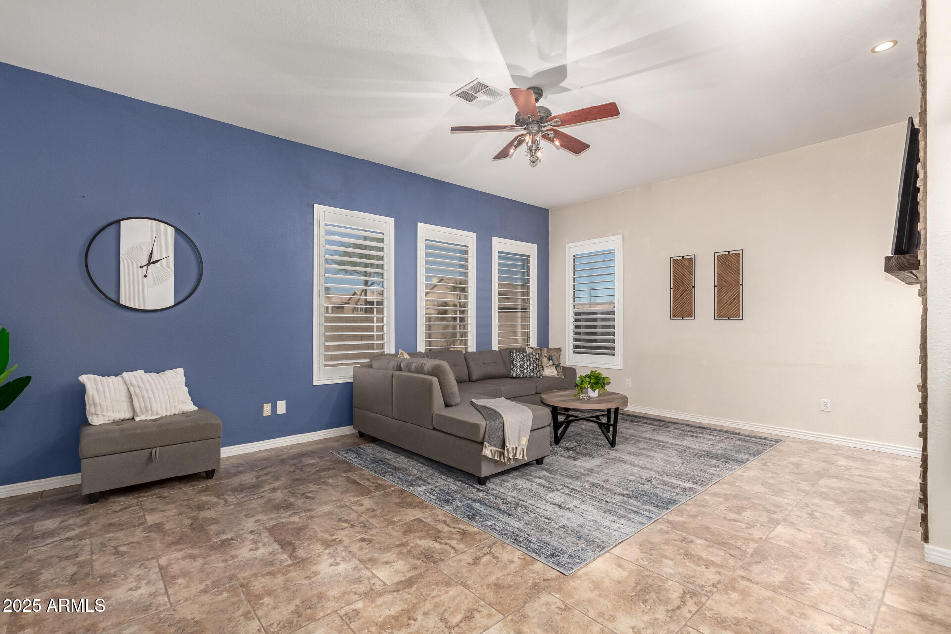 434 East Sheffield Avenue Gilbert, AZ 85296 - Photo 22 of 52 a living room with furniture and a large window