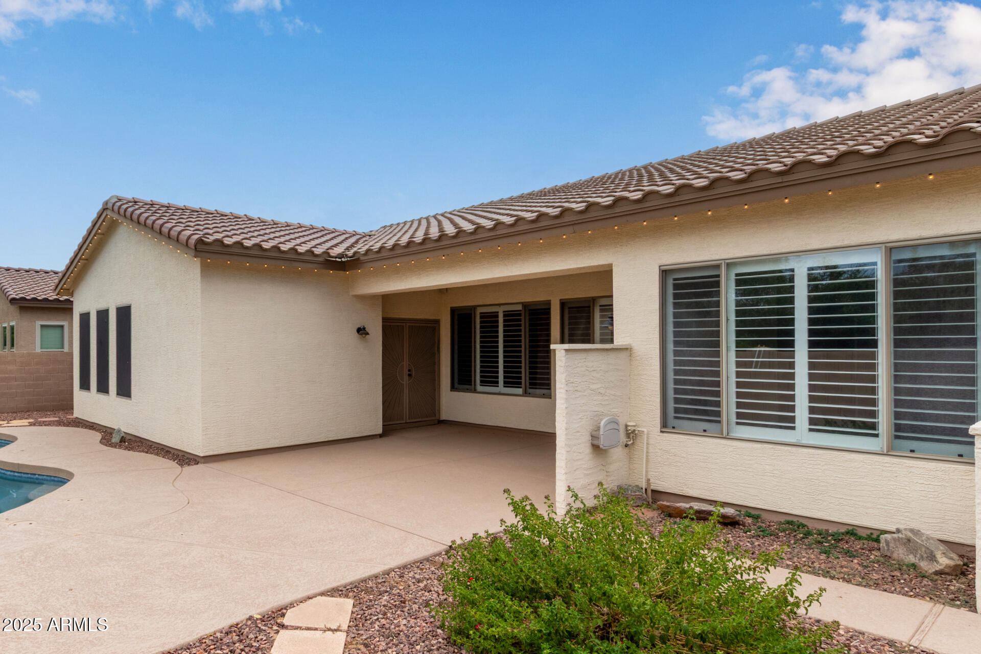 434 East Sheffield Avenue Gilbert, AZ 85296 - Photo 27 of 52 a front view of a house with a large window