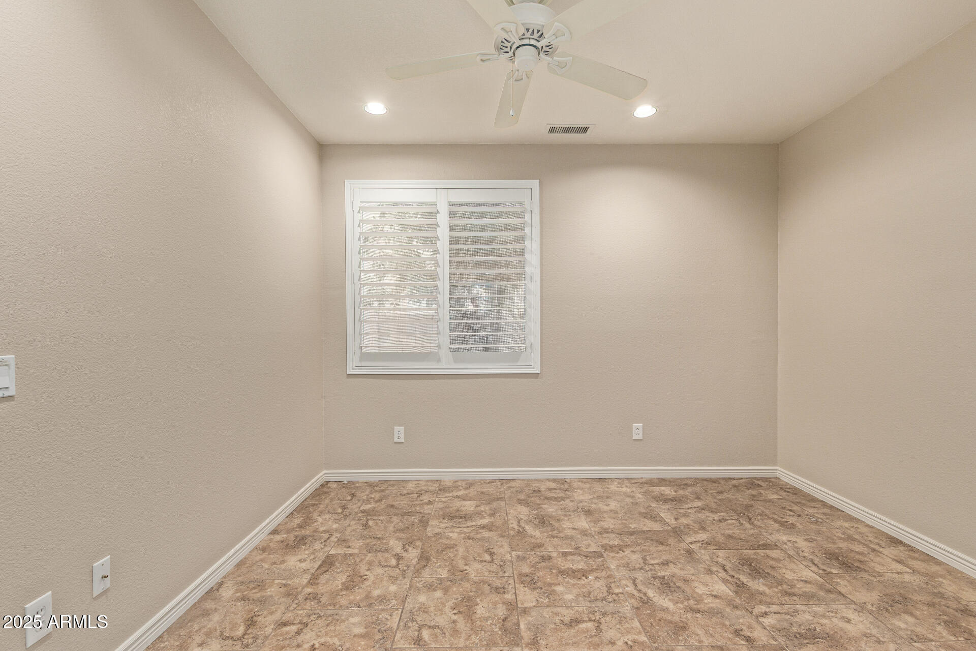 434 East Sheffield Avenue Gilbert, AZ 85296 - Photo 31 of 52 an empty room with a window
