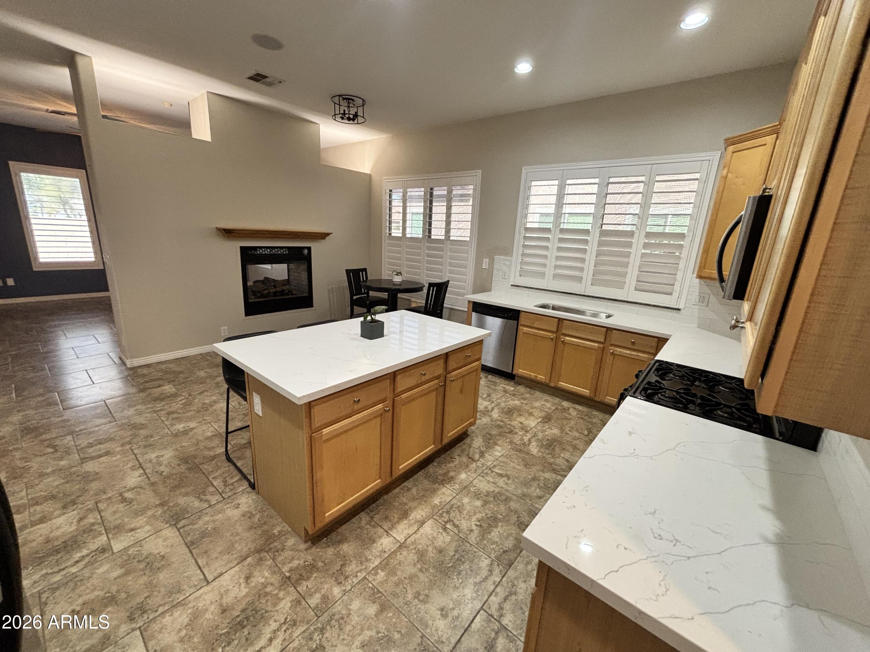 434 East Sheffield Avenue Gilbert, AZ 85296 - Photo 7 of 52 a view of living room with furniture and fireplace