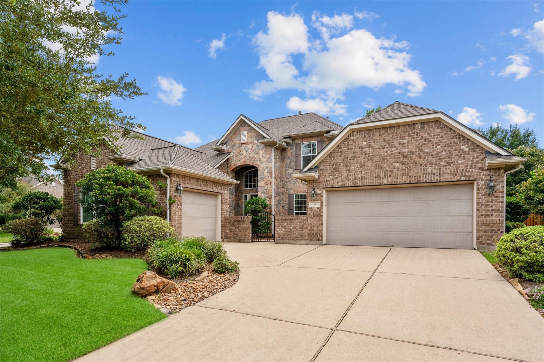 3 Indigo Bunting Place Spring, TX 77389 - Photo 2 of 41 Welcome to your next home, featuring a desirable three-car garage, large windows, and great curb appeal!