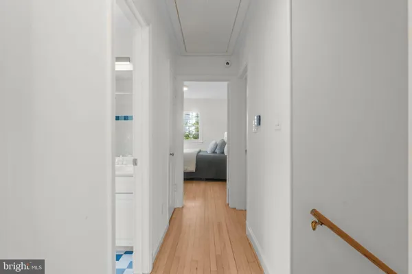 a view of a bedroom from a hallway