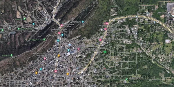 a view of a road with trees in front of it