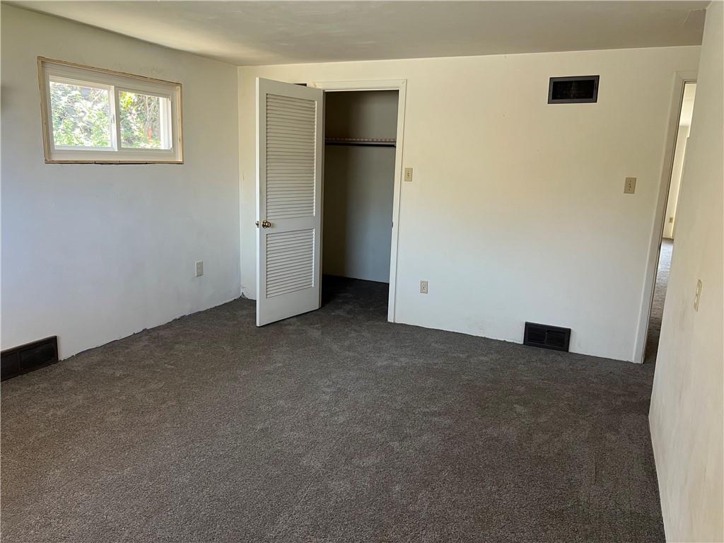 1512 Ridge Avenue New Kensington, PA 15068 - Photo 14 of 20 an empty room with closet and windows