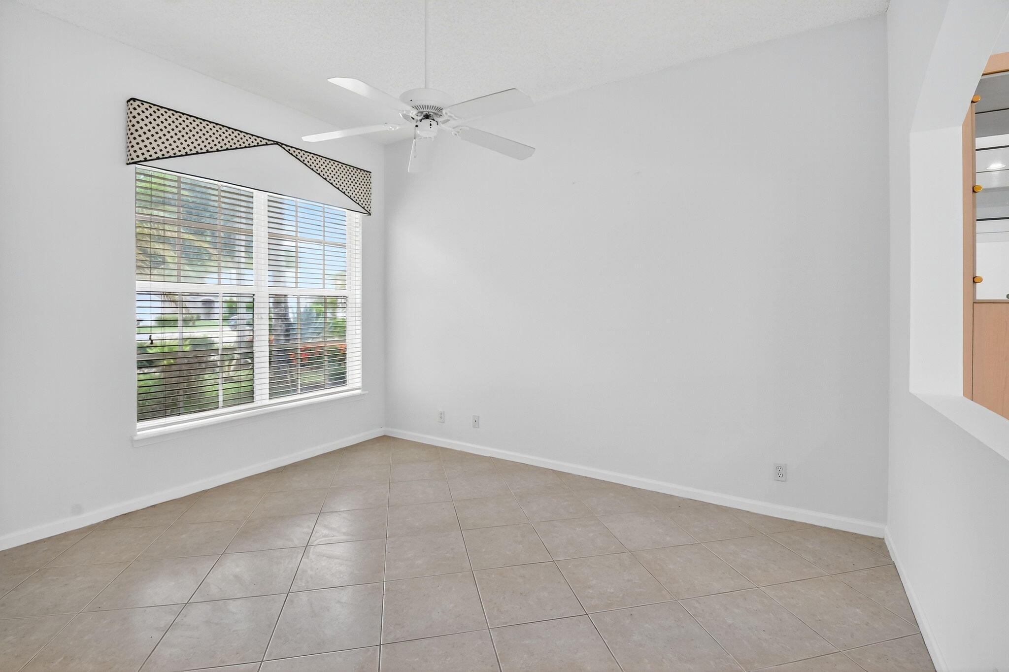 7975 Rockford Road Boynton Beach, FL 33472 - Photo 25 of 79 an empty room with windows and closet