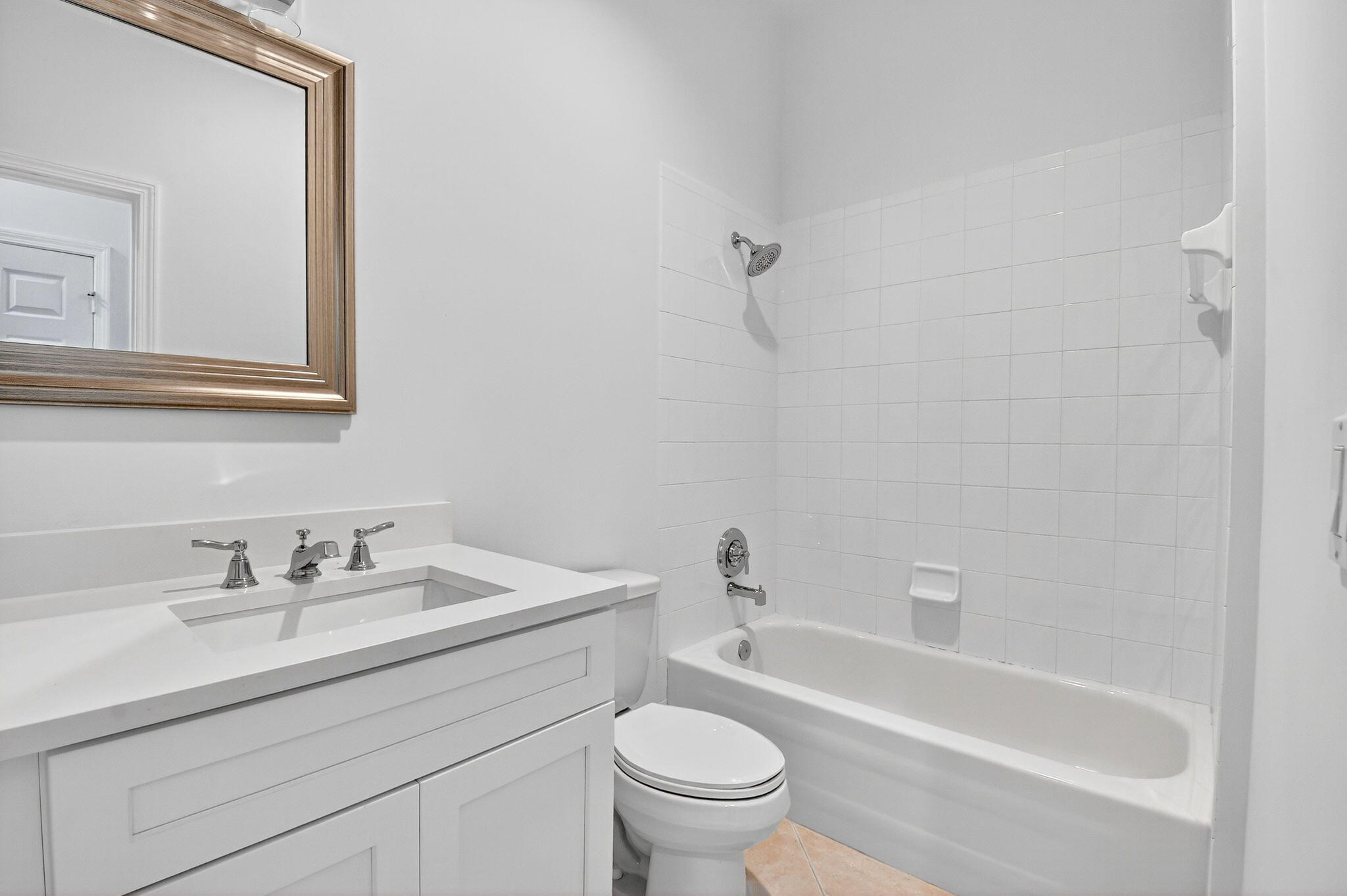 7975 Rockford Road Boynton Beach, FL 33472 - Photo 31 of 79 a bathroom with a sink toilet and bathtub