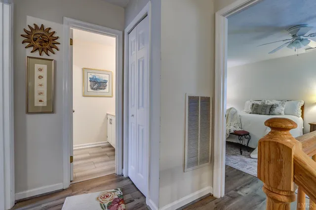 a bedroom with furniture and a window