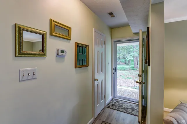a view of a bedroom from a hallway