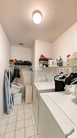 a kitchen with a sink and a stove top oven