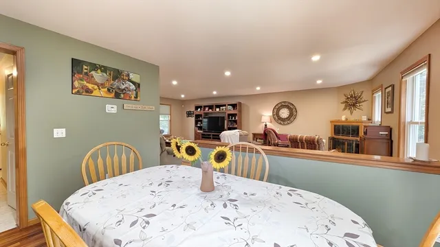 a view of a kitchen with dining area