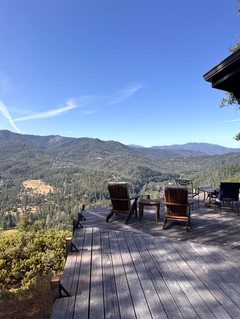 1200 Mountain Springs Road Lewiston, CA 96052 - Photo 3 of 57 a view of a terrace with a table and chairs