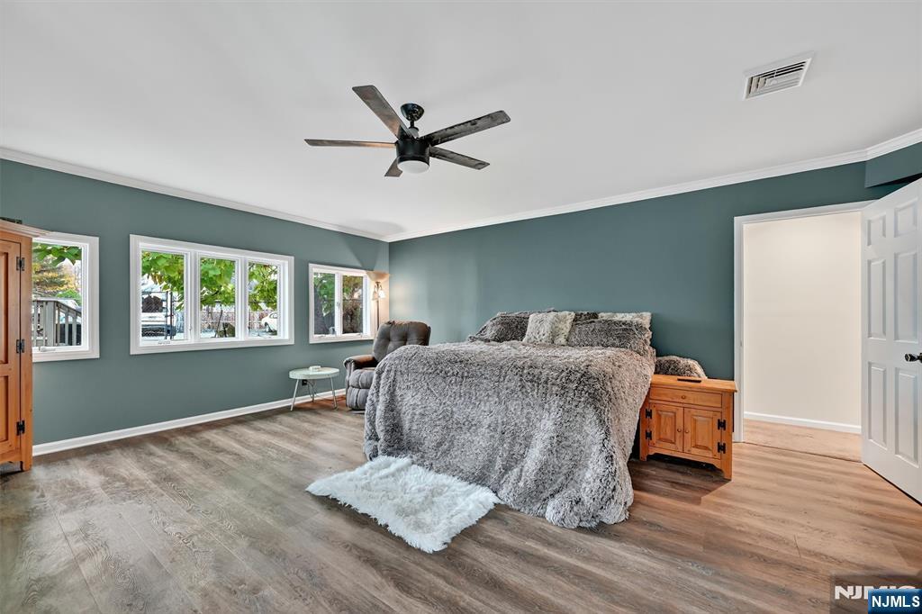 13 Main Street Paterson, NJ 07503 - Photo 12 of 46 a living room with furniture and window