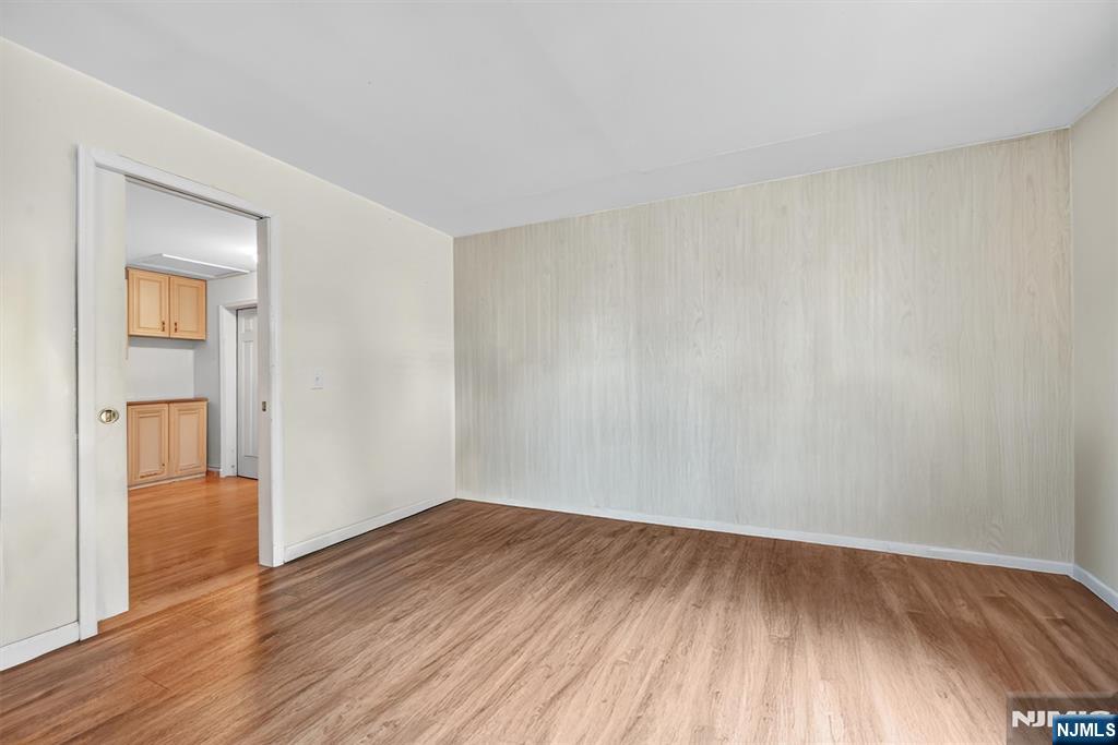 13 Main Street Paterson, NJ 07503 - Photo 3 of 46 a view of a room with wooden floor and a hallway