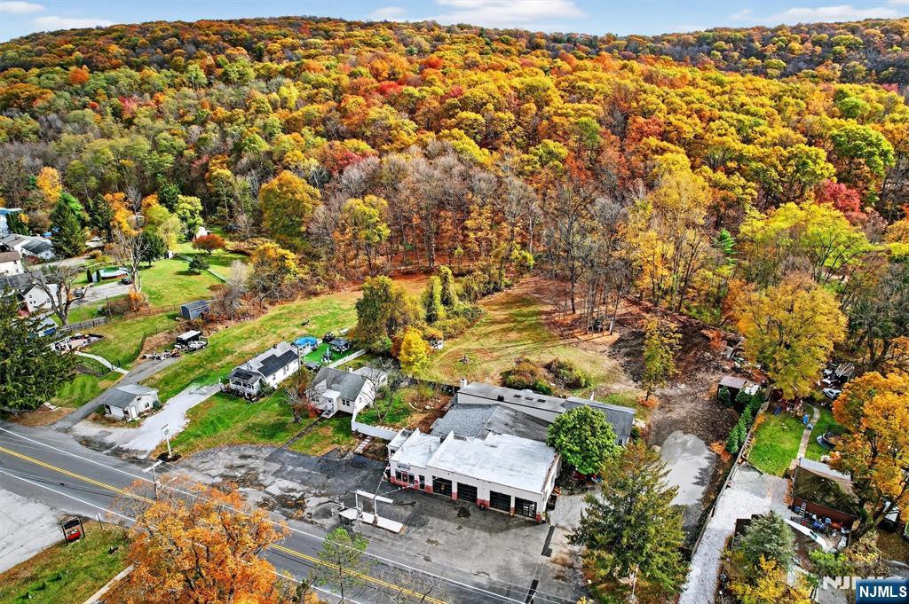 13 Main Street Paterson, NJ 07503 - Photo 35 of 46 an aerial view of residential houses with outdoor space