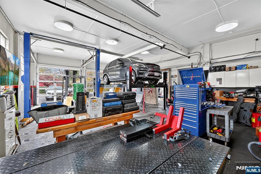 13 Main Street Paterson, NJ 07503 - Photo 38 of 46 a storage room with gym equipment
