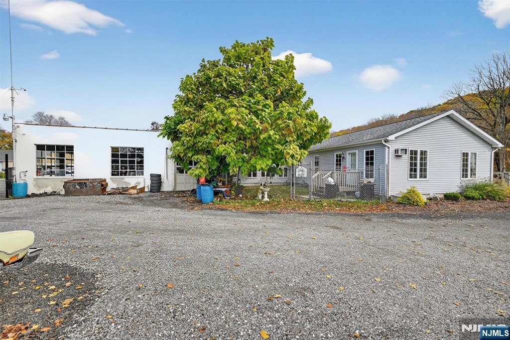13 Main Street Paterson, NJ 07503 - Photo 42 of 46 a view of a house with backyard and trees