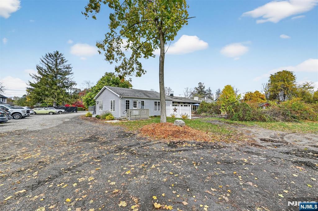 13 Main Street Paterson, NJ 07503 - Photo 43 of 46 a front view of a house with garden