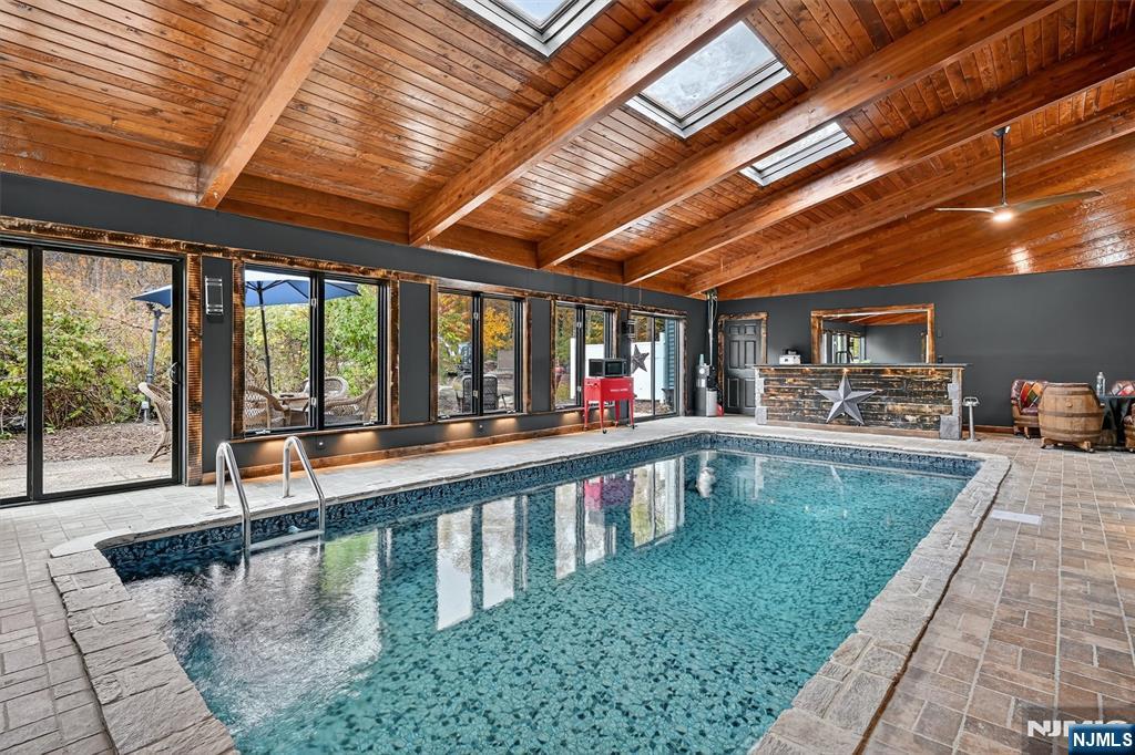 13 Main Street Paterson, NJ 07503 - Photo 10 of 46 a view of swimming pool with seating area