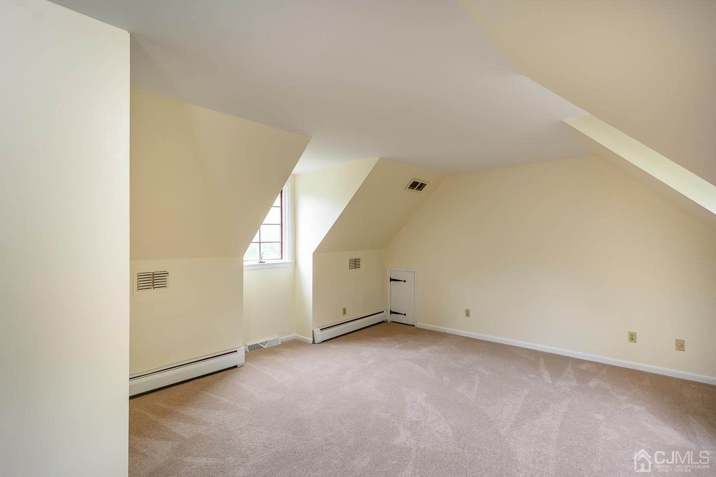 62 Linvale Road Ringoes, NJ 08551 - Photo 11 of 19 an empty room with windows