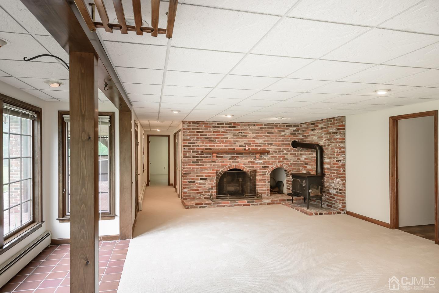 62 Linvale Road Ringoes, NJ 08551 - Photo 14 of 19 a view of a livingroom with a fireplace