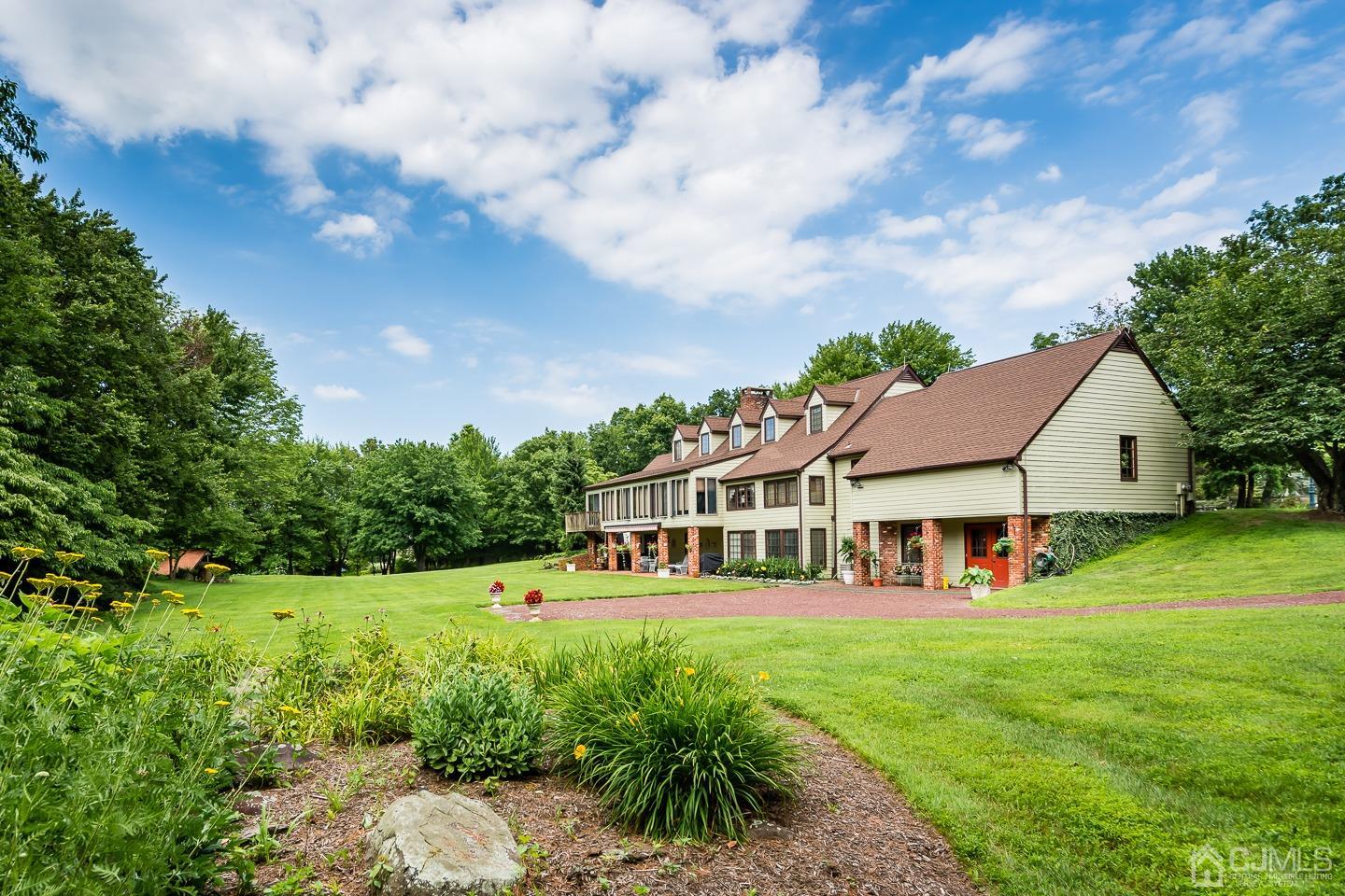 62 Linvale Road Ringoes, NJ 08551 - Photo 17 of 19 a view of a house with pool and garden