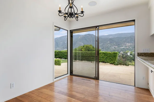 a view of a room with a large window