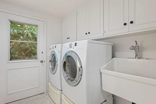 a utility room with dryer and washer